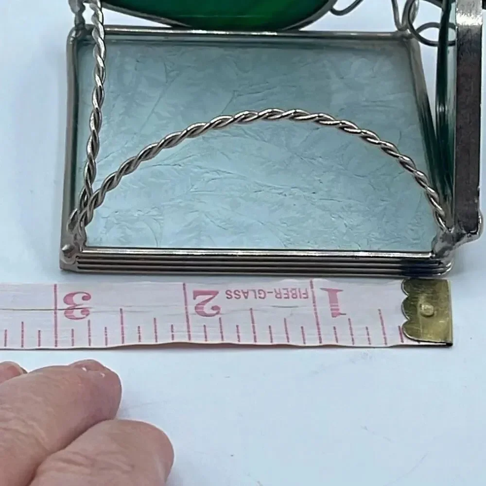 Stained glass leaded framed tea light holder.